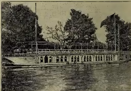 A black and white photograph of an Oxford University Barge, a long, flat-bottomed boat with a covered deck and a flag flying from the stern.