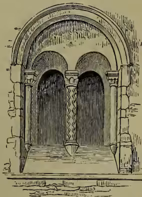 Architectural drawing of a Gothic window. It shows a large pointed arch containing two smaller pointed arches. The structure is supported by columns with capitals. The drawing illustrates the typical features of early Gothic or Norman windows, including the pointed arches and the use of columns.