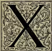 A large, ornate, blackletter capital letter 'X' with decorative flourishes, set within a square frame.