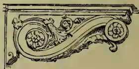 A detailed woodcut-style illustration of a decorative cantilever bracket. It features a curved, ornate base with intricate scrollwork and a central circular motif, supporting a horizontal ledge with a decorative profile.