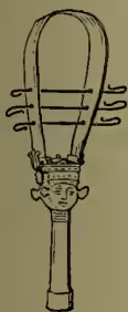 A simple line drawing of an ancient Egyptian sistrum, a musical instrument consisting of a long handle with a head containing a cross-shaped frame and several horizontal strings.