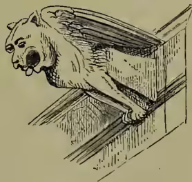 A black and white line drawing of a gargoylic creature, possibly a griffin or a winged lion, perched on a stone ledge or parapet. The creature has a human-like face with a wide-open mouth, large eyes, and a small nose. It has a muscular body with large, leathery wings spread wide. Its front paws are resting on the edge of the ledge, and its hind legs are visible behind it. The drawing is detailed, showing the texture of the stone and the creature's fur or feathers.