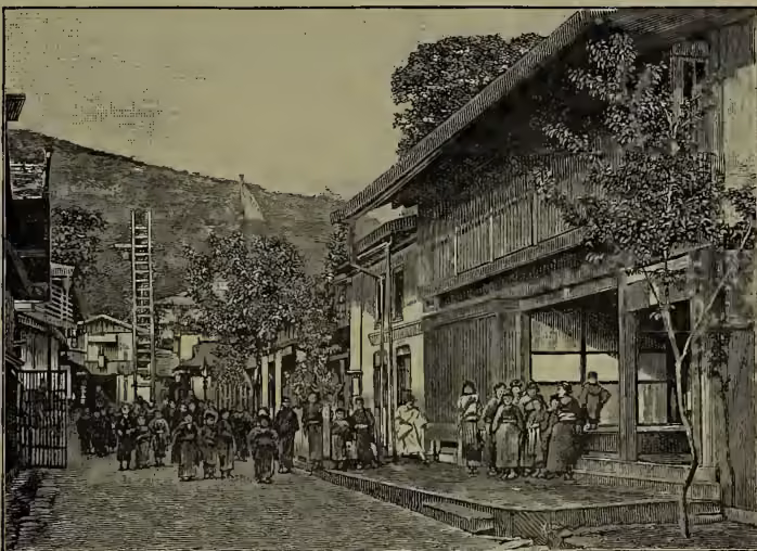 A black and white illustration of a street scene in Suwa, Japan. The scene depicts a traditional Japanese street with wooden buildings, some with balconies. People are walking along the street, and a few are standing near the buildings. The architecture is characterized by dark wood and traditional roof styles. The overall atmosphere is one of a quiet, everyday life in a traditional Japanese town.
