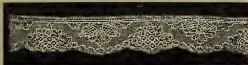 A horizontal strip of lace with a repeating pattern, identified as a border of Mechlin Pillow-lace.