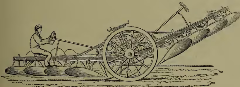 A black and white illustration of a large, detailed plough being pulled by a person. The plough has multiple blades and a large wheel. The person is seated and holding the reins.