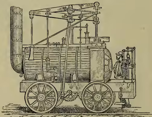 A detailed black and white illustration of the steam locomotive 'Puffing Billy'. It is a large, horizontal boiler with a tall, vertical smokestack at the front. The boiler is supported by four large, spoked wheels. A person is standing on a small platform at the rear of the locomotive, near the driver's seat. The illustration shows the intricate mechanical details of the engine, including the pistons and connecting rods.