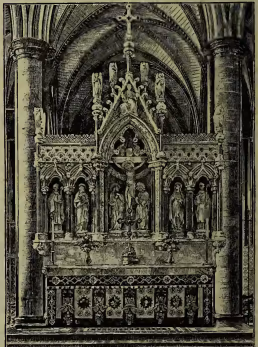 A detailed black and white engraving of a reredos in Salisbury Cathedral. The structure is highly ornate, featuring a central gothic archway containing a crucifix and several statues of saints. Flanking the central arch are smaller niches, each housing a statue. The entire structure is supported by a base with intricate carvings and is set against a background of pointed arches and columns, characteristic of Gothic architecture.