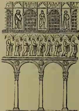 A black and white illustration of a Romanesque interior. The top section shows a series of arched niches containing statues of figures. Below this is a frieze with a row of standing figures. The bottom section features three large, pointed arches supported by columns with decorative capitals.