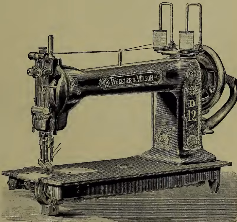 A detailed illustration of a Wheeler & Wilson No. 12 sewing machine. The machine is shown from a side-front perspective, featuring a large treadle wheel on the right, a decorative 'WHEELER & WILSON' brand name on the side, and the number '12' on the front panel. It is equipped with two upper thread guides and a complex needle and throat assembly.