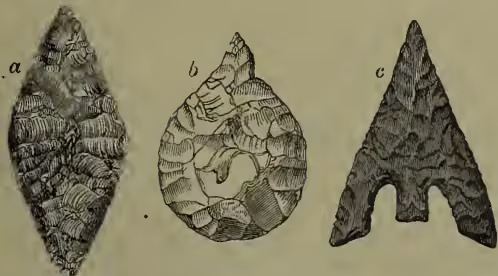 Three flint arrow-heads: (a) a lozenge-shaped head with a notched base, (b) a leaf-shaped head with a notched base, and (c) a barbed head with a notched base.